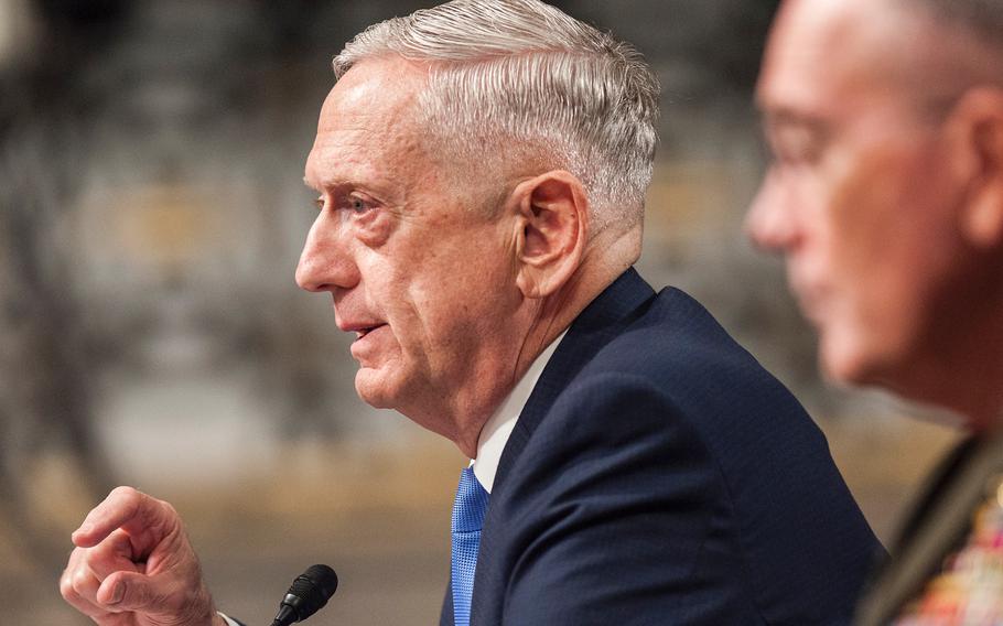 Secretary of Defense Jim Mattis testifies at a Senate Armed Services Committee hearing Tuesday, Oct. 3, 2017, on Capitol Hill in Washington. Mattis pledged to the committee that "the Department of Defense will be fully responsive to your requirement to be kept appraised of current and planned operations." In the foreground is Chairman of the Joints Chiefs of Staff, Gen. Joseph Dunford.