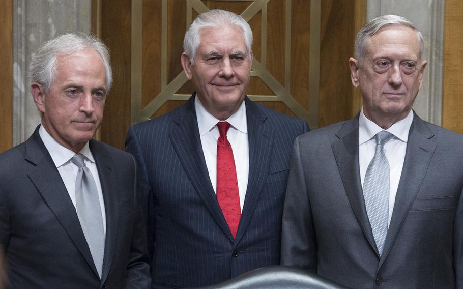 Senate Foreign Relations Committee Chairman Bob Corker, R-Tenn., Secretary of State Rex Tillerson and Secretary of Defense Jim Mattis, left to right, pose for a photo before a hearing on authorizations for the use of military force, Oct. 30, 2017 on Capitol Hill.
