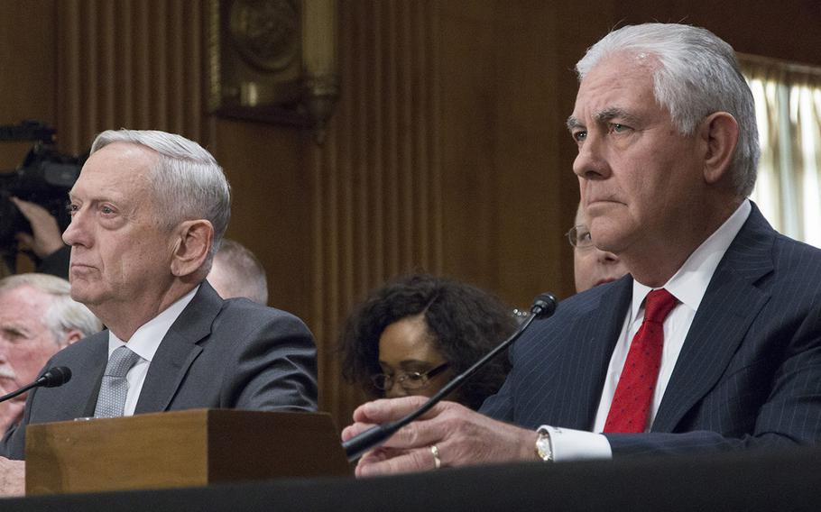 Secretary of Defense Jim Mattis and Secretary of State Rex Tillerson listen during a Senate Foreign Relations Committee hearing on authorizations for the use of military force, Oct. 30, 2017 on Capitol Hill.