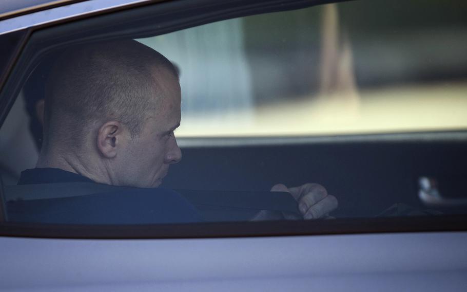 Bowe Bergdahl, demoted from sergeant to private and given a dishonorable discharge, is driven away from the    Fort Bragg, N.C., court facility on Friday, Nov. 3, 2017. Bergdahl, who walked off his base in Afghanistan in 2009 and was held by the Taliban for five years, was spared a prison sentence.
