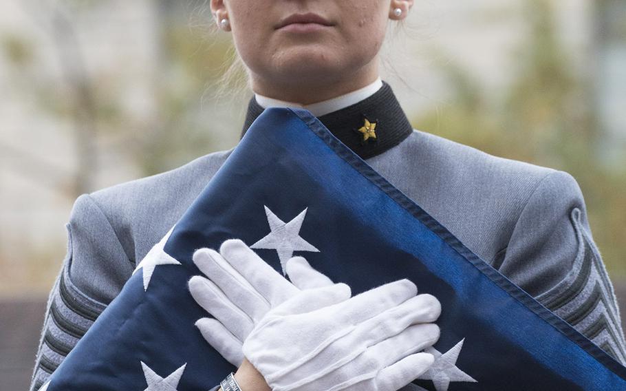 A flag that flew over the U.S. Capitol awaits presentation to Sandra Sinclair Pershing during the groundbreaking ceremony for the National World War I Memorial at Pershing Park in Washington, D.C., Nov. 9, 2017.