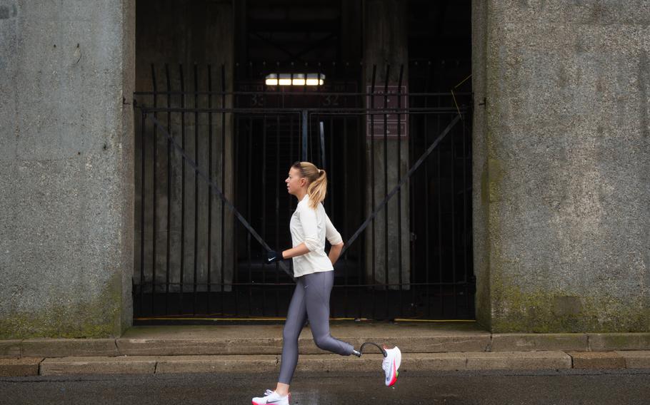Adrianne Haslet runs in preparation for the Boston Marathon in Allston, Mass., on April 8, 2022.