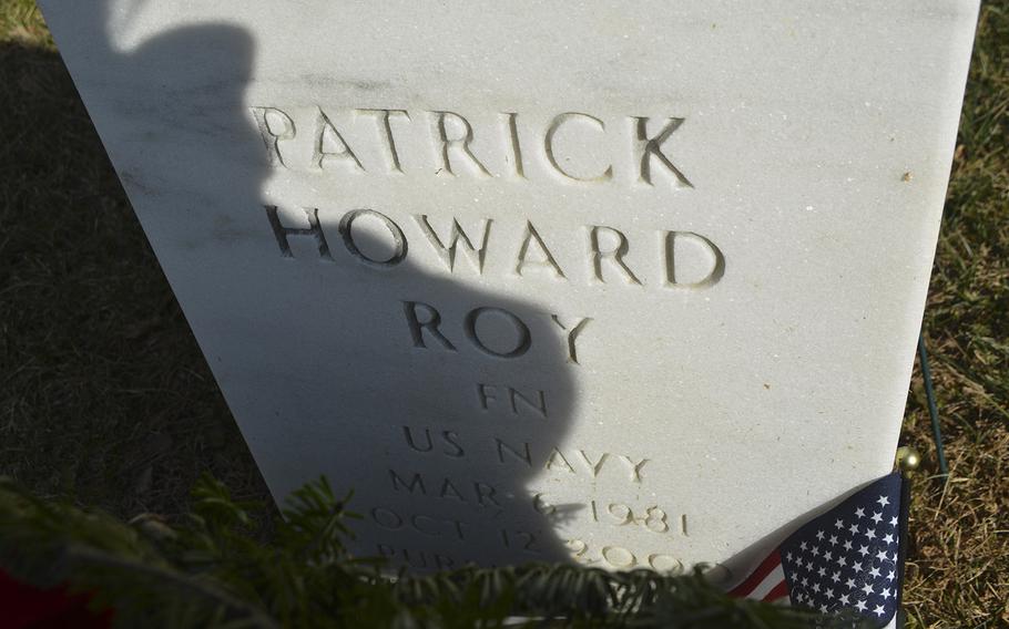 The grave of Patrick Howard Roy, who died in the 2000 attack on the USS Cole, at Antietam National Cemetery in Sharpsburg, Md., December 16, 2017.