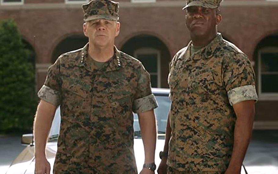 Gen. Robert Neller, left, commandant of the Marine Corps., and Sgt. Maj. Ronald Green in a USMC video.


