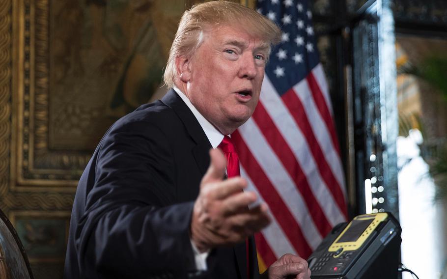 President Donald Trump speaks during a Christmas Eve event at his Mar-a-Lago estate in Palm Beach, Fla., on Dec. 24, 2017. 