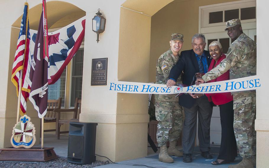From left, Col. John A. Smyrski III, commander of William Beaumont Army Medical Center; John Ost III, director of the Army Fisher House Program; Alice Coleman, manager of WBAMC Fisher House; and Command Sgt. Maj. Donald George of WBAMC cut the ribbon to the newly renovated Fisher House on the WBAMC campus in El Paso, Texas, on May 12, 2017. The Fisher House provides military-affiliated families room and board at no cost throughout the duration of care for inpatient servicemembers, retirees or veterans at nearby health care facilities.