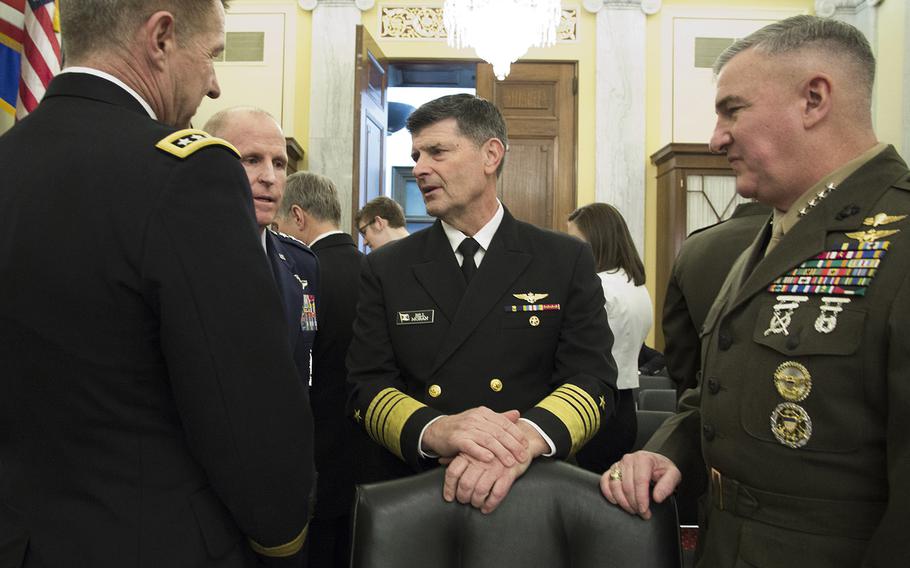 Army Vice Chief of Staff Gen. James C. McConville, Air Force Vice Chief of Staff Gen. Stephen W. Wilson, Vice Chief of Naval Operations Adm. William F. Moran and Marine Corps Assistant Commandant Gen. Glenn M. Walters, left to right, talk before a Senate Armed Services subcommittee hearing on the current readiness of U.S. forces, Feb. 14, 2018 on Capitol Hill.