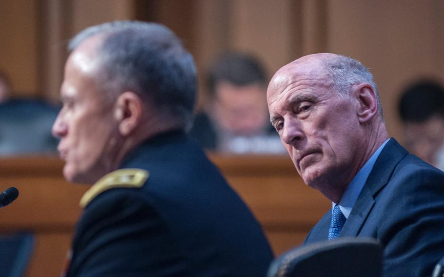 Director of National Intelligence Dan Coats, right, looks on as Defense Intelligence Agency Director Lt. Gen. Robert Ashley testifies before the Senate Armed Services Committee during a hearing Tuesday, March 6, 2018, on Capitol Hill in Washington, D.C.