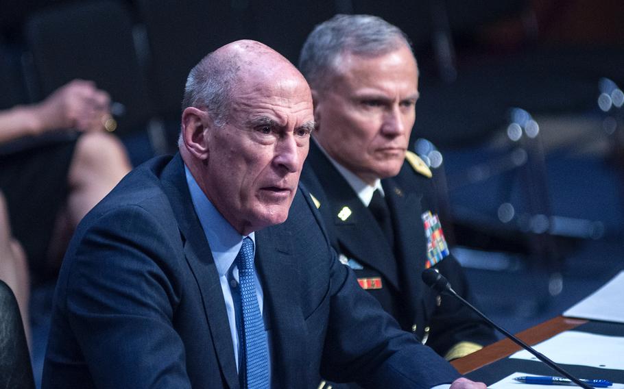 Director of National Intelligence Dan Coats responds to tough questioning as Defense Intelligence Agency Director Lt. Gen. Robert Ashley looks on during a Senate Armed Services Committee hearing Tuesday, March 6, 2018, on Capitol Hill in Washington, D.C. Coats noted that with Vladimir Putin in charge in Russia, "we’re getting a wake-up call. The Russian bear came out of hibernation." 