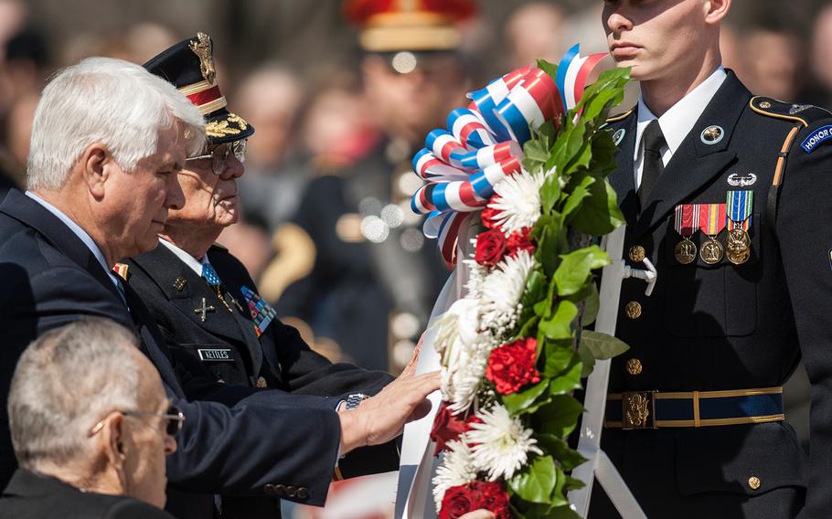 Medal of Honor recipients Ronald Rosser, foreground, James McCloughan, center, and Charles Kettles take part in a wreath laying ceremony at Arlington National Cemetery's Tomb of the Unknowns on Friday, March 23, 2018. The three were among more than two dozen MOH recipients who attended the commemorative event, which was part of the annual National Medal of Honor Day.