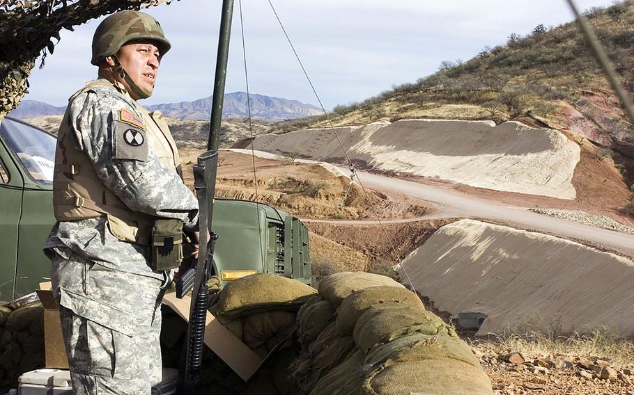 An Army National Guard soldier works as a member of an entry identification team watching the U.S./Mexico border near Nogales, Arizona on Jan. 17, 2007.
