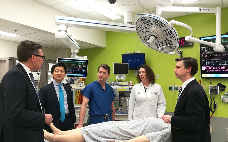 From left, Dr. Gerald Brandacher, Dr. W.P. Andrew Lee, Dr. Richard Redett, Assistant Professor of Plastic and Reconstructive Surgery Carisa Cooney and Dr. Damon Cooney following the world's first transplant of a penis and scrotum on a wounded soldier.