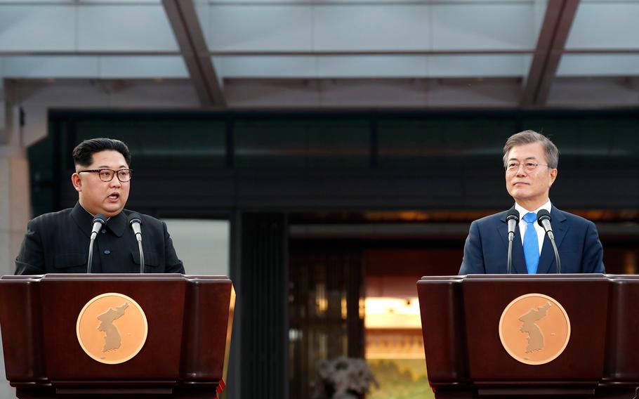 North Korean leader Kim Jong Un speaks alongside South Korean President Moon Jae-in during a meeting at the Inter-Korean Summit on Friday, April 27, 2018.
