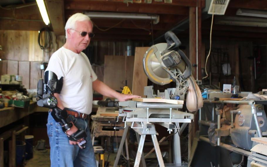 Maryland Army National Guard veteran Dave Wherry assembles his MyoPro arm brace. Wherry suffered a stroke in 2011 which left him paralyzed on the right side of his body. With the help of his MyoPro, created by robotics company by Myomo Incorporated, he has regained functionality in his arm. 