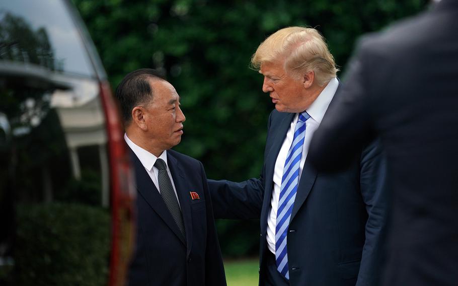 President Donald Trump talks with Kim Yong Chol, former North Korean military intelligence chief and one of leader Kim Jong Un's closest aides, after their meeting in the Oval Office of the White House in Washington, Friday, June 1, 2018.