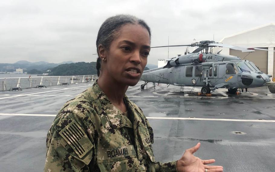 Capt. Lynelle Boamah, executive officer of the USNS Mercy, speaks aboard the hospital ship during its recent visit to Japan. 