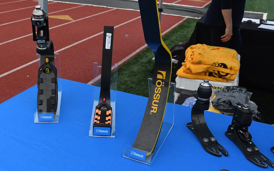 Ossur prosthetic legs and running blades are displayed at the Challenged Athletes Foundation clinic on June 23, 2018. One of the participants, 15-year-old Scott Wren, received a surprise new Ossur running blade so that he can play basketball. 