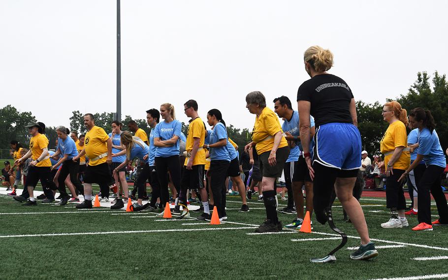 Retired Army Colonel Patty Collins runs with other amputees at the Challenged Athletes Foundation clinic on June 23, 2018. Collins lost part of her left leg in a biking accident, but has continued to compete in triathlons and exercise daily.  