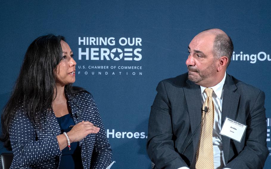 White House Deputy Director and Special Advisor to the President Jennifer Korn speaks during a military spouse employment summit held at the U.S. Chamber of Commerce headquarters in Washington, D.C. on Thursday, June 28, 2018. Looking on is Deloitte Principal of Federal Strategy and Operations Jon Baba.