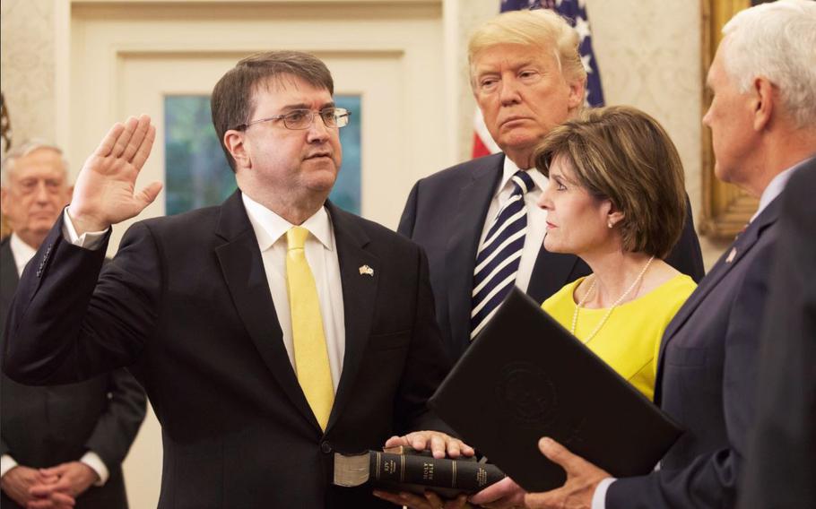 Robert Wilkie is sworn in as the new Veterans Affairs Secretary at the White House on Monday, July 30, 2018.