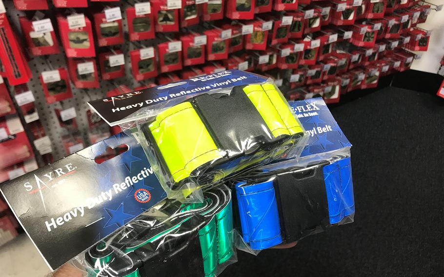 A variety of reflective safety belts are pictured here for sale at the Army and Air Force Exchange Service uniform clothing shop on Kleber Kaserne in Kaiserslautern on Wednesday, Aug. 15, 2018.