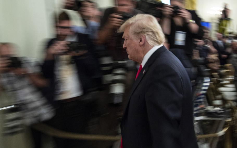 President Donald Trump leaves a Medal of Honor ceremony for the late Air Force Tech. Sgt. John Chapman at the White House, Aug. 22, 2018.