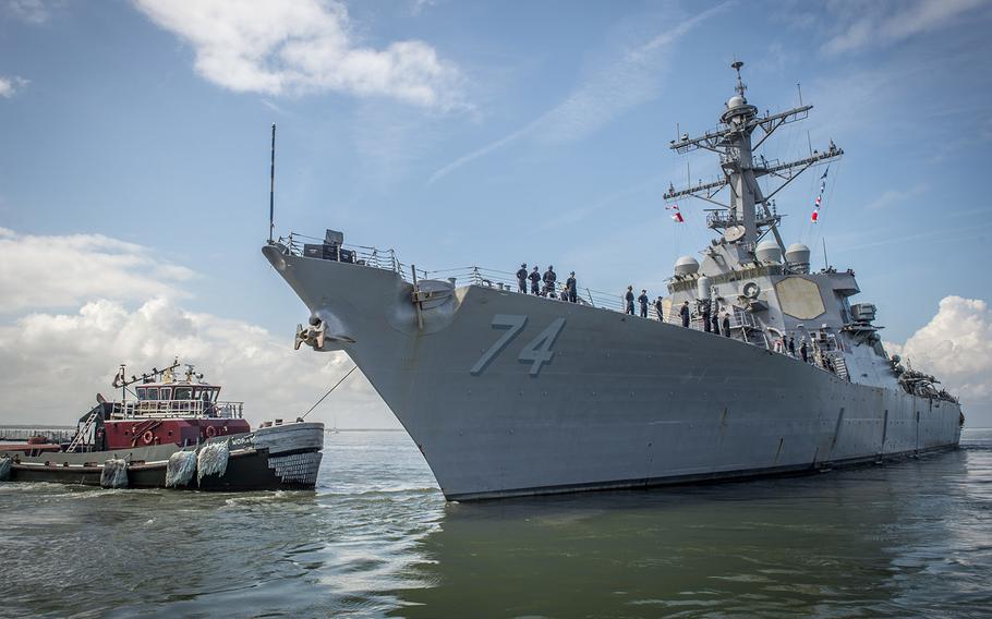 The guided-missile destroyer USS McFaul departs Naval Station Norfolk in preparation for Hurricane Florence, Sept. 10, 2018.