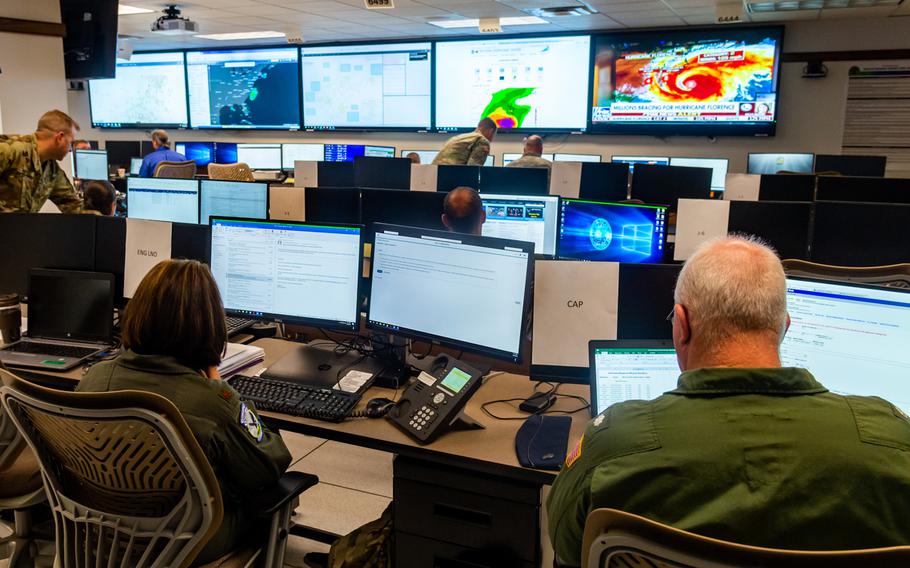 Members of the West Virginia Army and Air National Guard monitor and coordinate movement of National Guard assets and requests for assistance Sept. 13, 2018, at the West Virginia State Emergency Operations Center (SEOC) located at the WVNG Joint Force Headquarters (JFHQ) in Charleston, West Virginia. 