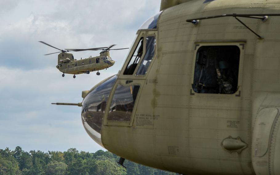Pennsylvania National Guard Soldiers and rescuers with the Pa. Helicopter Aquatic Rescue Team (PA-HART) arrive at McEntire Joint National Guard Base, Eastover, S.C. on Thursday, Sept. 13, 2018 ahead of Hurricane Florence.