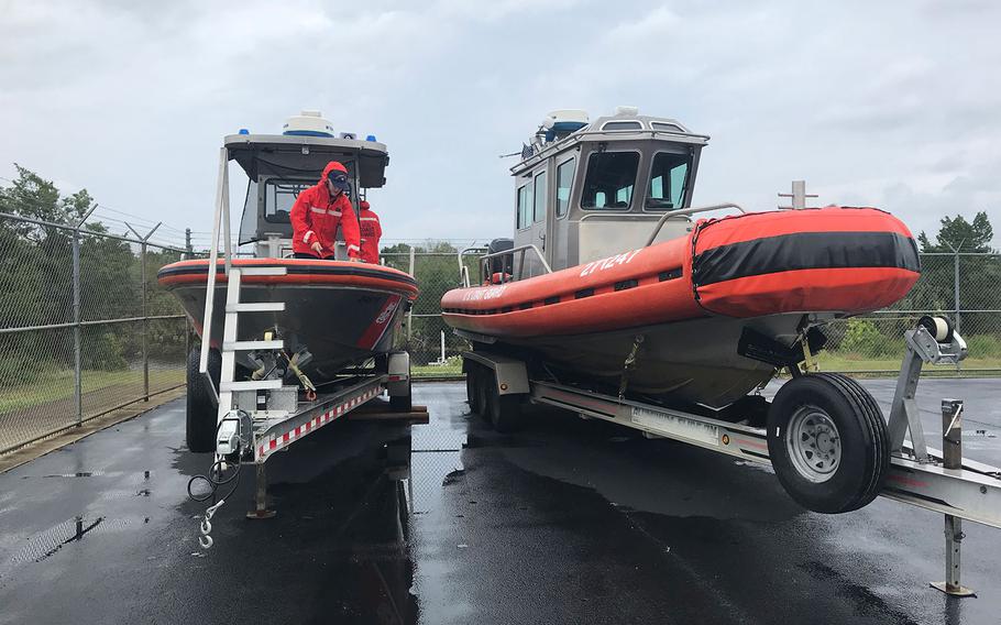 Crew members from Coast Guard Station Yankeetown conduct checks on response boats, Wednesday, Oct. 10, 2018 in Yankeetown, Florida ahead of Hurricane Michael making landfall.