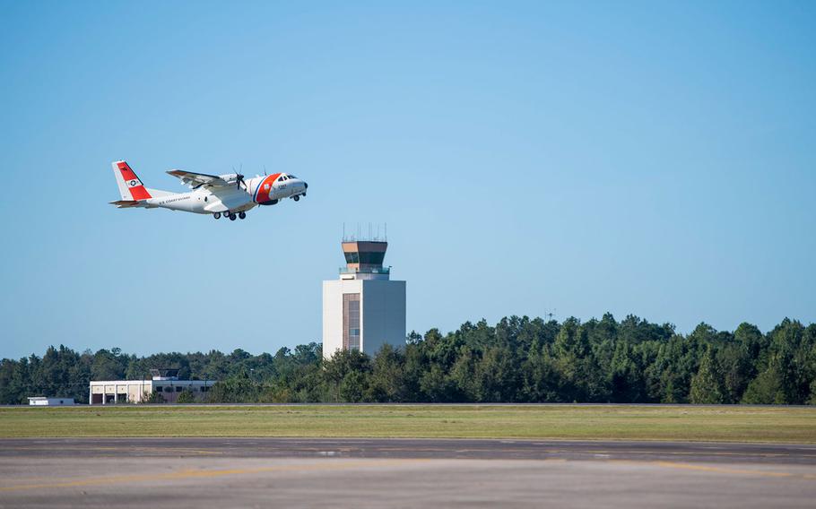 A Coast Guard HC-144 Ocean Sentry launches on a search and rescue case from Coast Guard Aviation Training Center Mobile, Alabama, as part of the Hurricane Michael response, Oct. 11, 2018. 