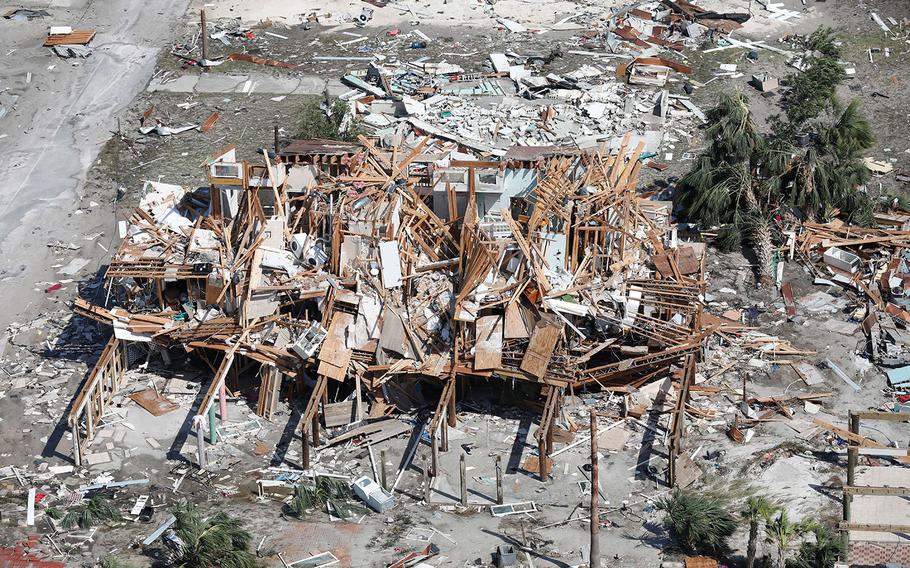 A UH-60 Black Hawk flight crew conducts a flyover of the Florida panhandle in the aftermath of Hurricane Michael as the storm left a swath of destruction across the area near Panama City, Florida, Oct. 11, 2018.