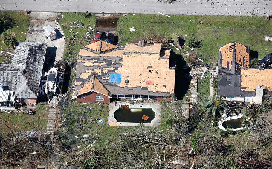 A U.S. Customs and Border Protection Air and Marine Operations UH-60 Black Hawk flight crew conduct a flyover of the Florida panhandle in the aftermath of Hurricane Michael as the storm left a swath of destruction across the area near Panama City, Florida, October 11, 2018. 