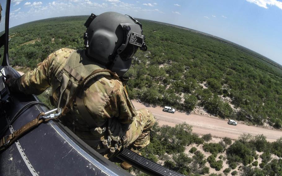 National Guard troops  provide airborne support to the U.S. Department of Homeland Security near the southwest border with Mexico in McAllen, Texas, along the Rio Grande Valley in July 2018.