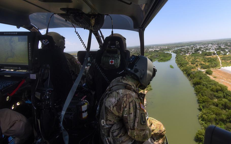 National Guard troops  provide airborne support to the U.S. Department of Homeland Security near the southwest border with Mexico in McAllen, Texas, along the Rio Grande Valley in July 2018.