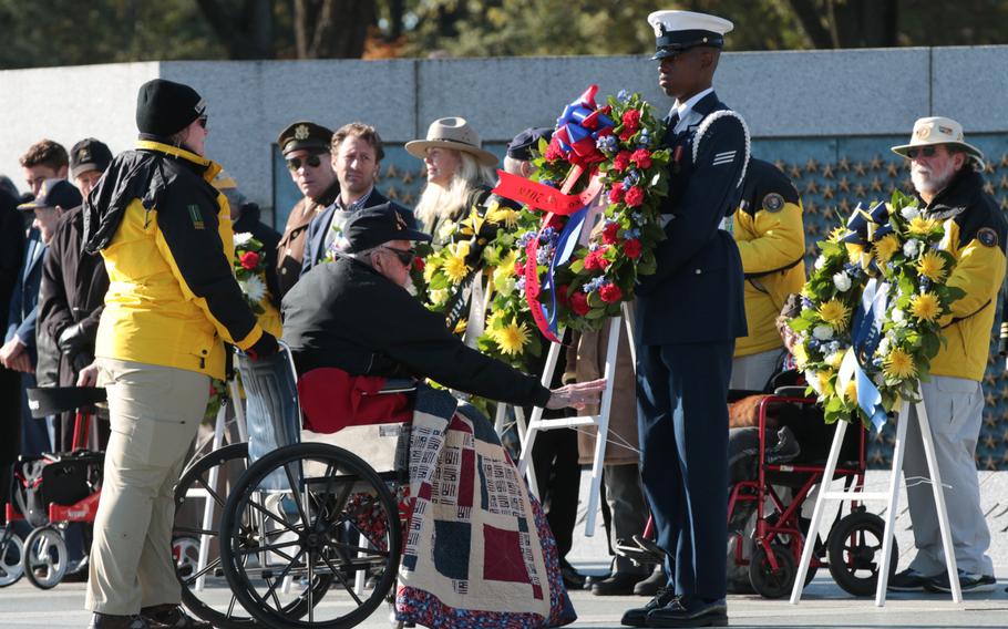 World War II veterans and veterans honoring servicemembers from that era laid wreaths at the National World War II Memorial in Washington, D.C., as part of the Veterans Day remembrances held throughout the city on Sunday, Nov. 11, 2018.