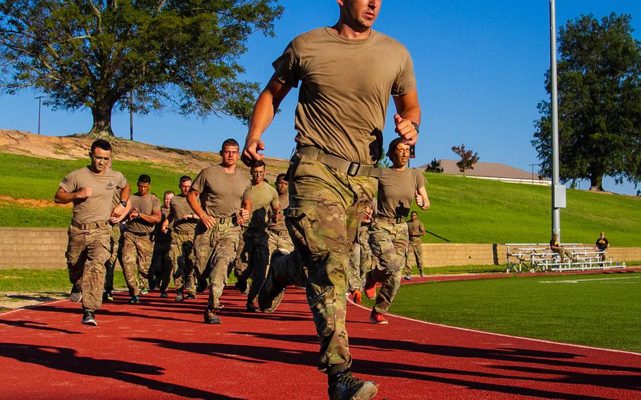 Soldiers assigned to 5th Squadron, 73rd Calvary Regiment, 3rd Brigade Combat Team, 82nd Airborne Division begin the 2-mile run portion of the Army Physical Fitness Test event as part of a deployment readiness exercise July 10, 2018 at Fort Bragg, N.C.