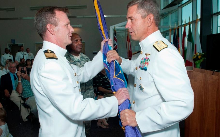 Retired U.S. Navy captain Jeffrey Breslau (left) pleaded guilty in federal court in San Diego on Thursday to a criminal conflict of interest charge in the 'Fat Leonard' corruption scandal.