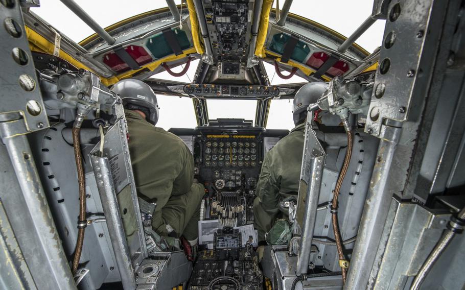 Pilots from the 69th Bomb Squadron go through a pre-flight checklist inside the cockpit of a B-52H Stratofortress before a training sortie at Minot Air Force Base, N.D., Jan. 14, 2016. 