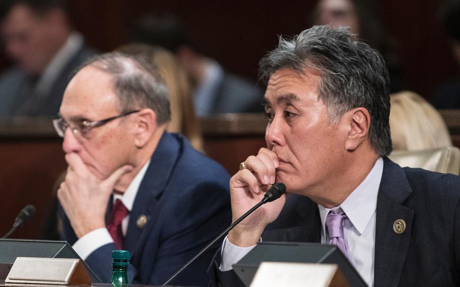 Mark Takano, D-Calif., slated to become the next Chairman of the House Committee on Veterans Affairs listens as VA Secretary Robert Wilkie testifies during a hearing on Capitol Hill in Washington on Wednesday, Dec. 19, 2018. Also listening in the background is the current committee Chairman Phil Roe, R-Tenn.