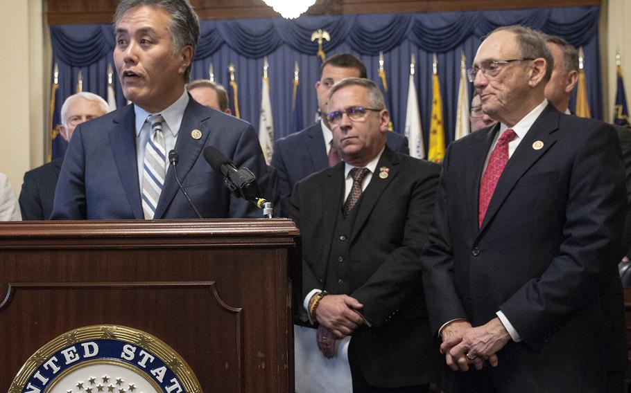 Rep. Mark Takano, D-Calif., speaks in favor of benefits for "Blue Water Navy" veterans at a Capitol Hill press conference in December, 2018. Takano, now chairman on the House Veterans' Affairs Committee, and then-chairman Rep. Phil Roe, R-Tenn., right, now the ranking member, have introduced bills at the start of the new Congress to extend benefits to the affected veterans.