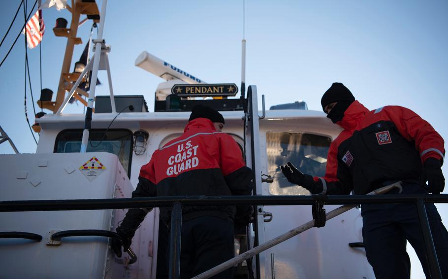 The crew of Coast Guard Cutter Pendant, a 65-foot Small Harbor Tug based out of Boston, makes preparations to get underway to break ice on the Weymouth Fore River, Tuesday, Jan. 22, 2019. The Coast Guard was able to pay its members their Dec. 31 paychecks, but missed their next payday on Jan. 15 and may miss the Feb. 1 paycheck due to the government shutdown.