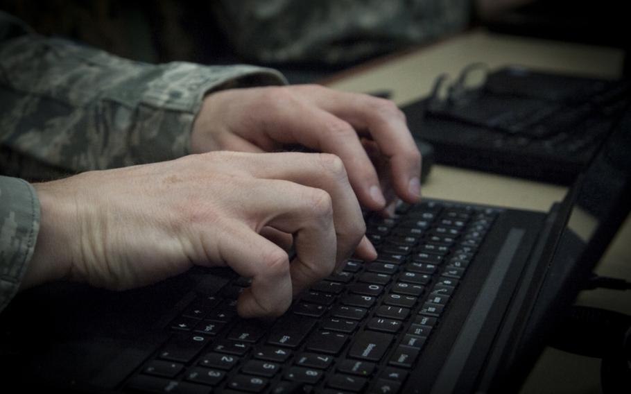 An airman types on his computer during the Cybersecurity Foundry Course at MacDill Air Force Base, Fla., March 9, 2018.