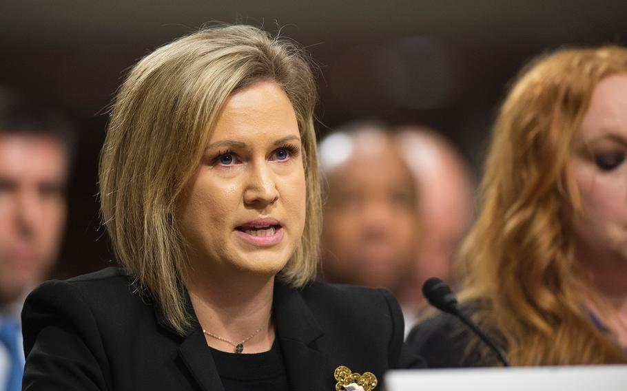 Marine Corps spouse Crystal Cornwalll testifies Wednesday, Feb. 13, 2019, during a Senate hearing on Capitol Hill in Washington where lawmakers heard disturbing stories of poor conditions in military housing.