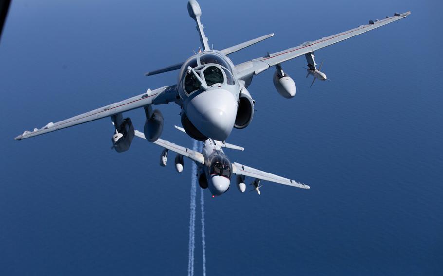 Two U.S. Marine Corps EA-6B Prowler assigned to Marine Tactical Electronic Warfare Squadron (VMAQ) 2, fly off the coast of North Carolina, Feb 28, 2019.