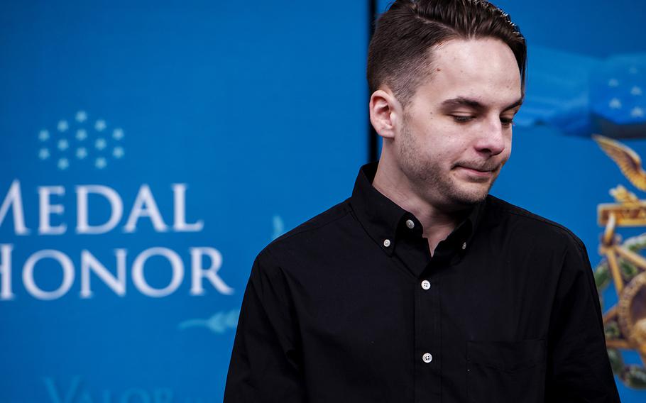 Trevor Oliver speaks Tuesday about his father, Army Staff Sgt. Travis Atkins, who was killed in Iraq in 2007, after tackling a suicide bomber and shielding his fellow soldiers from the attack. Oliver will accept the Medal of Honor on behalf of his fallen father on Wednesday at the White House. 