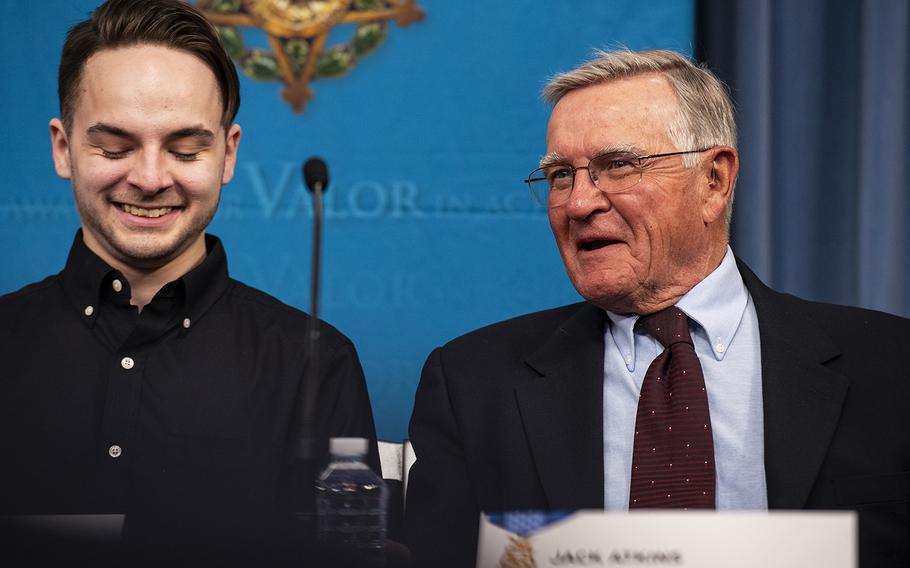 Jack Atkins, right, laughs with his grandson Trevor Oliver as he recalls his fallen son, Army Staff Sgt. Travis Atkins, who was killed in action in Iraq in 2007. Oliver will accept the Medal of Honor on behalf of his father on Wednesday. 
