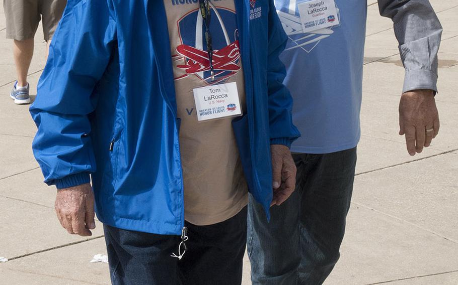 Navy veteran Tom LaRocca and Greater St. Louis Honor Flight guardian Joseph LaRocca arriva at the National World War II Memorial in Washington, D.C., March 30, 2019.