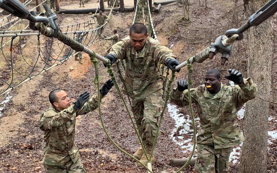 Cesar Vargas (left) participates in Army Reserve Basic Combat Training in this undated photo.