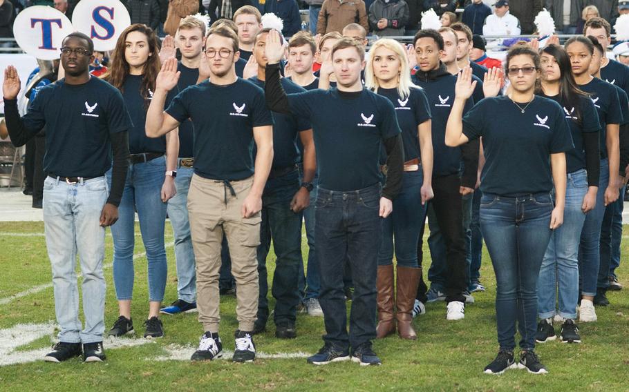 Air Force recruits are sworn into military service at Amon G. Carter Stadium, Fort Worth, Texas, Dec. 23, 2016.